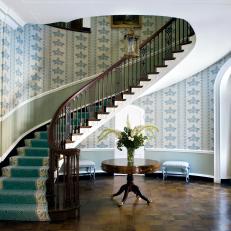 Elegant Foyer With Sweeping Staircase