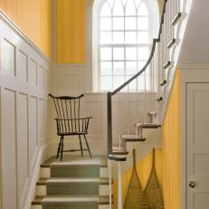 Transitional Staircase With Cheery Yellow Wallpaper