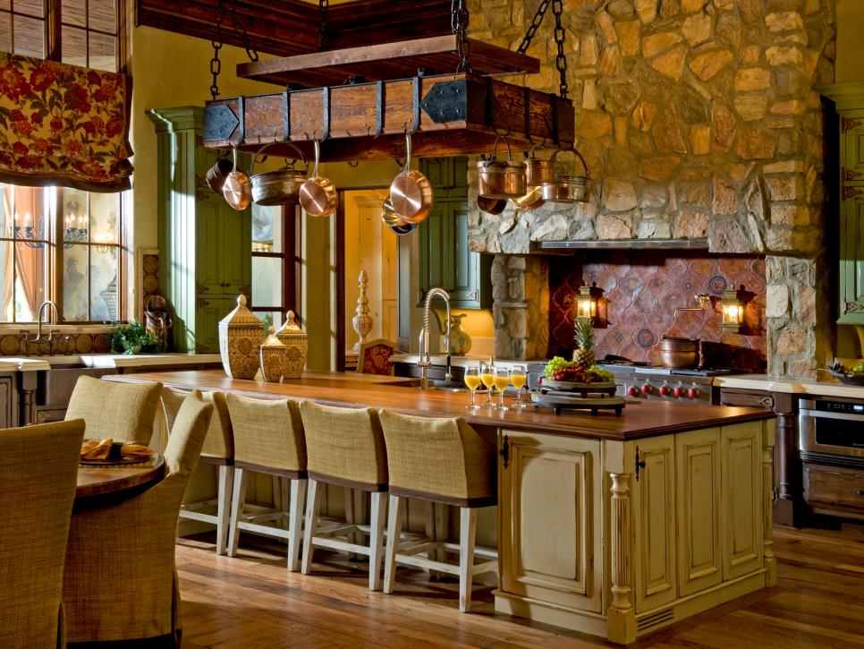 Mediterranean Kitchen With Large Rustic Island and Pot Rack | HGTV