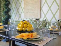 Dining Area With Patterned Wall, Espresso Table and Lemon Centerpiece