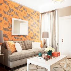 Eclectic Living Room With Neutral Sofa and Bold Floral Wallpaper