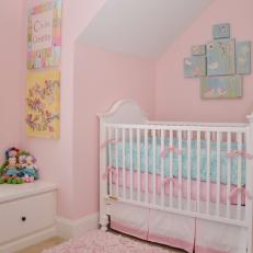 Pink Girl's Nursery With Crib Nook