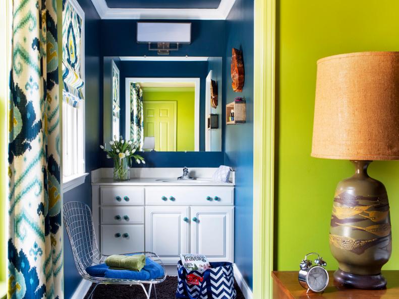 Small Navy Blue Bathroom Adjacent to Chartreuse Guest Bedroom