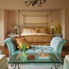 Tufted Turquoise Chaise in Mediterranean Inspired Bedroom