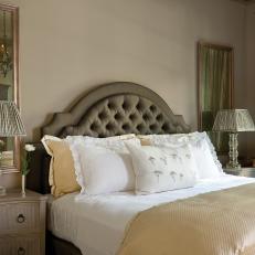 Traditional Bedroom With Green Tufted Headboard