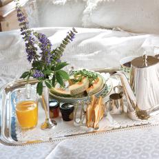 Silver Breakfast Tray With Teapot on White Comforter