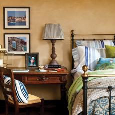 Coastal Bedroom With Wood and Iron Furniture