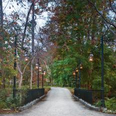 Traditional Stone Paved Bridge and Walkway With Outdoor Lanterns