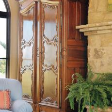 Antique Armoire With Blue Upholstered Chairs