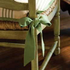 Striped Chair Cushion With Green Bow