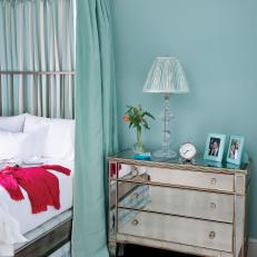 Transitional Blue Bedroom With Mirrored Chest