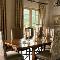 Gray Venetian Plaster Dining Room With Glass Hurricanes and Candlesticks