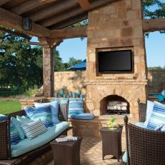 Relaxed Outdoor Living Area With Stone Fireplace