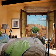 Southwestern Style Bedroom With Outdoor Seating Area