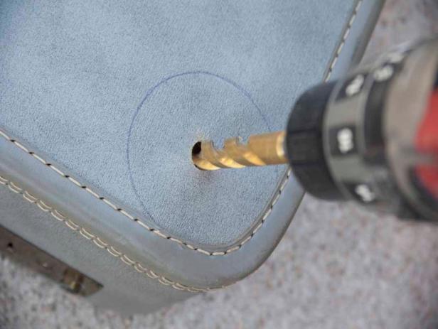 Drilling Hole in Suitcase