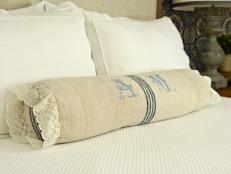 Handmade Bolster Pillow On Bed