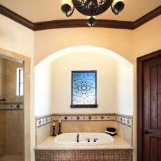 Luxurious Master Bathroom With Tiled Soaking Tub