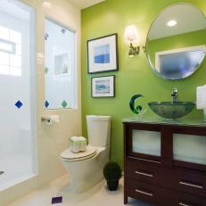 Green Eclectic Bathroom With Round Mirror and Vessel Sink