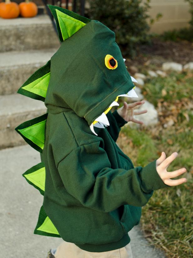 This dinosaur costume is simple to make with basic sewing skills and so comfy that kids will want to wear it after Halloween.
