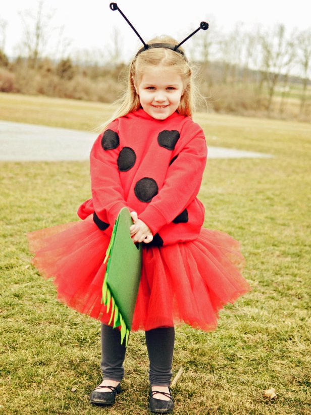 Girl wearing ladybug Halloween costume