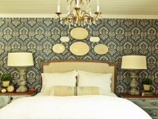 Blue and White Bedroom With Gold Chandelier 