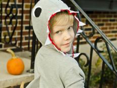 Inexpensive felt and basic sewing skills are all you need to turn a child's gray hoodie sweatshirt into a great white shark costume, perfect for Halloween or encouraging imaginative play.