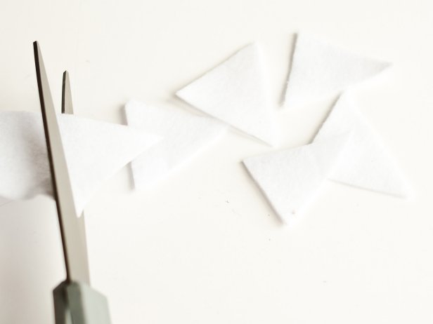 Cut white felt into triangles for &quot;teeth&quot;.