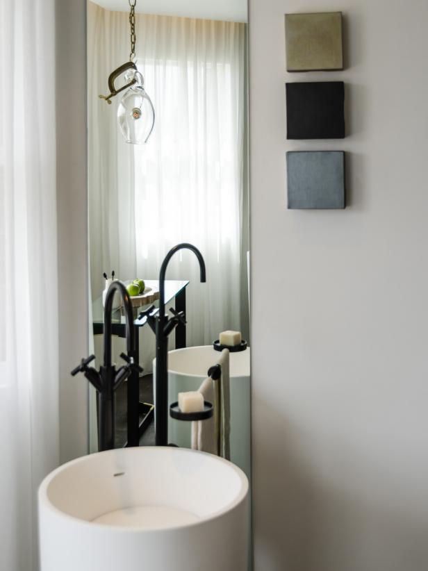 Modern Bathroom with White Bowl Sink and Black Faucet
