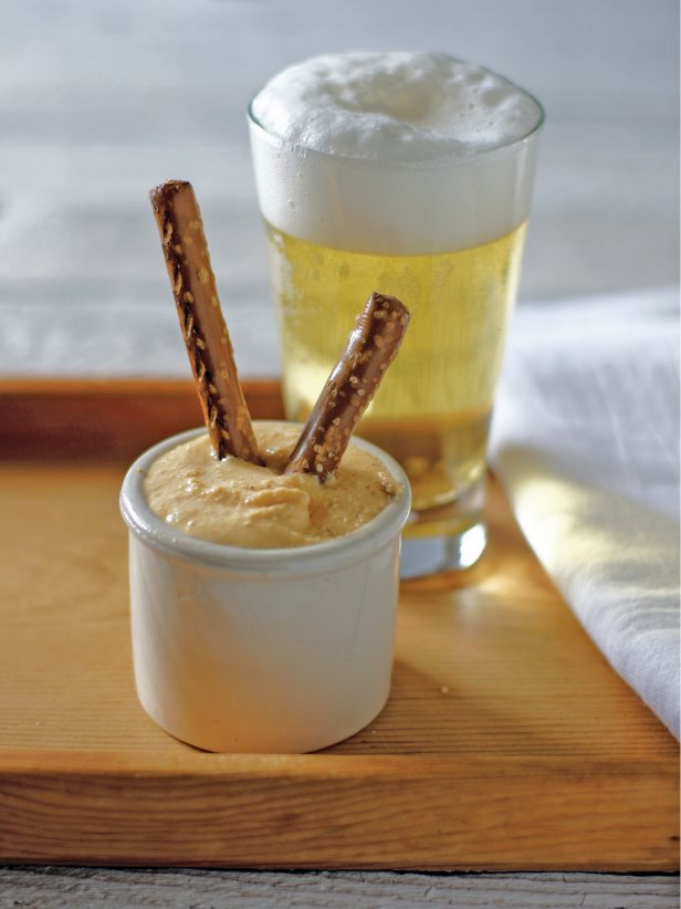 Pretzels in Beer Dip and a Glass of Beer