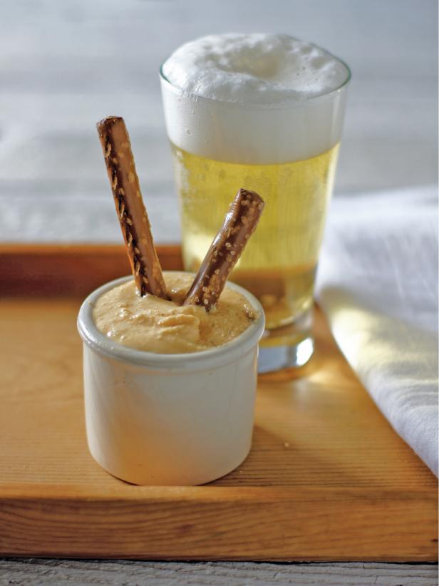 Pretzels in Beer Dip and a Glass of Beer