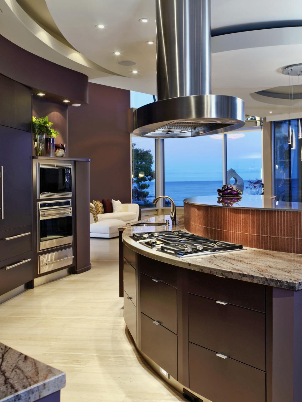 Modern Kitchen With Curving Dark Wood Cabinets | HGTV