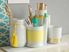 White and Yellow Containers Holding Desk Accessories