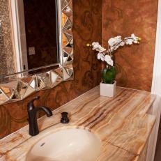 Rich Brown Bathroom With Metallic Mirror