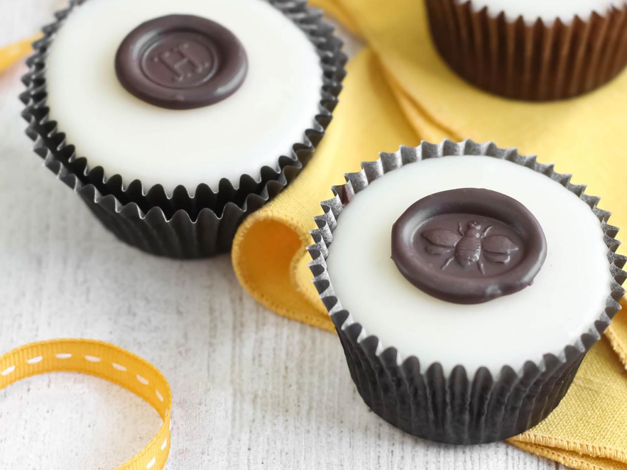 Chocolate Wax Seals on Poured Fondant Honey Cupcakes - Sprinkle Bakes