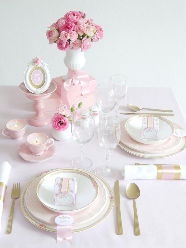 Pink Tablescape With Floral Centerpiece, Metallic Flatware, Votives