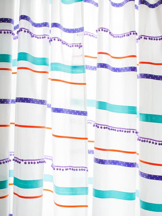 White Curtains With Colorful Pom-Pom Trim and Ribbon Stripes