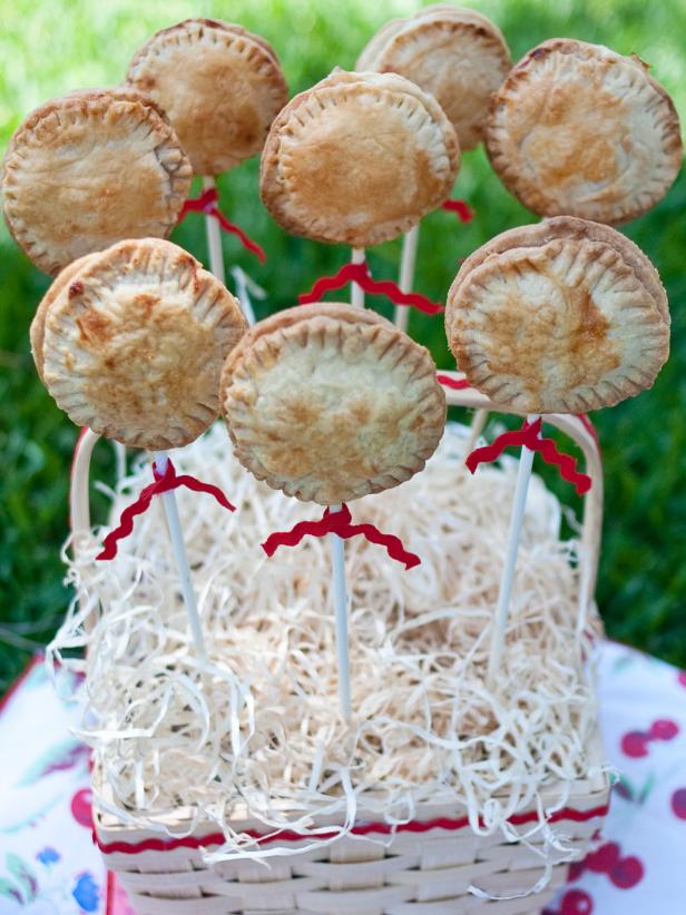 Desserts on stick served in basket