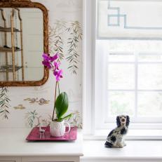 White Asian Wallpaper and Dog Figurine