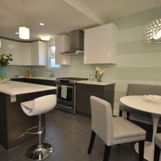Modern Eat-in Kitchen With Horizontal Green Stripes