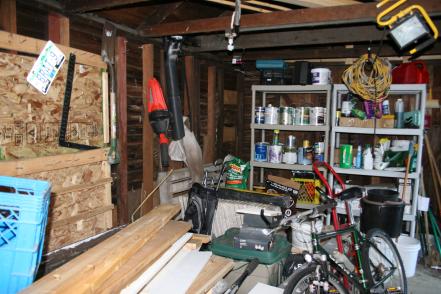 Before: Packed Garage With Leaky Roof