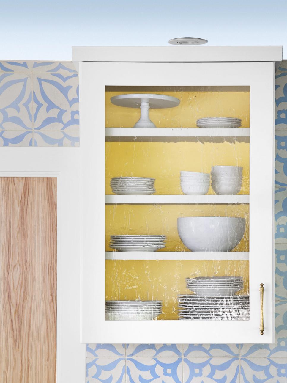 White Kitchen Cabinet With Yellow Interior | HGTV