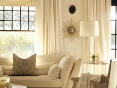 Designer Lisa Sherry creates a chic living room and sunroom with touches of white.