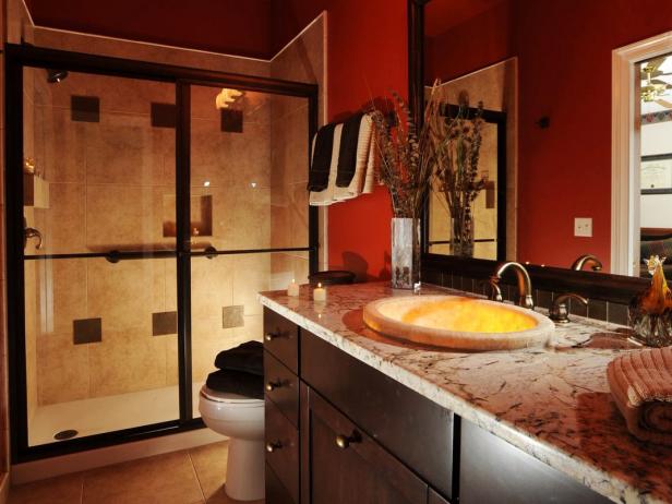 Red Bathroom With Neutral Tiled Shower and Mosaic Tile Sink 