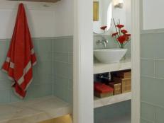 Designer Kathy Geissler Best creates a functional poolside bathroom with different activity zones.