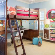 Eclectic Girl's Bedroom With Blue Walls and Lofted Bed