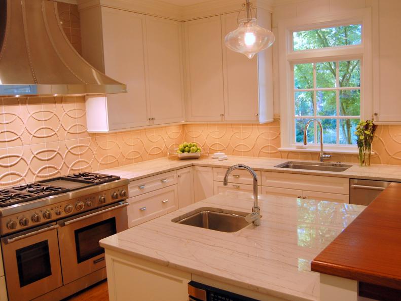 Quartzite counter tops in a white kitchen.  
