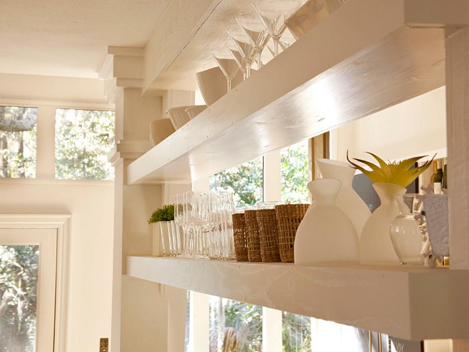 White Shelves With Kitchen Glasses, Vases and Baskets