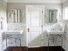 Designer Marianne Brown transforms her bathroom into a master bath complete with Calacatta marble tile, a large shower and two console sinks.