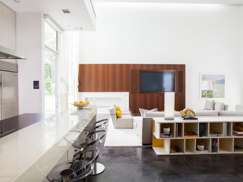 Large Modern Kitchen with Room Divider Shelving and Concrete Floor