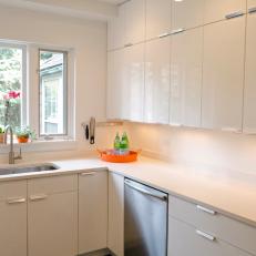 White Modern Kitchen With Orange Tray